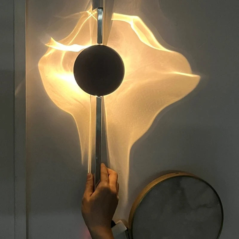 Velwave™ Wandleuchte mit verstellbarer Wellenlicht-Projektion