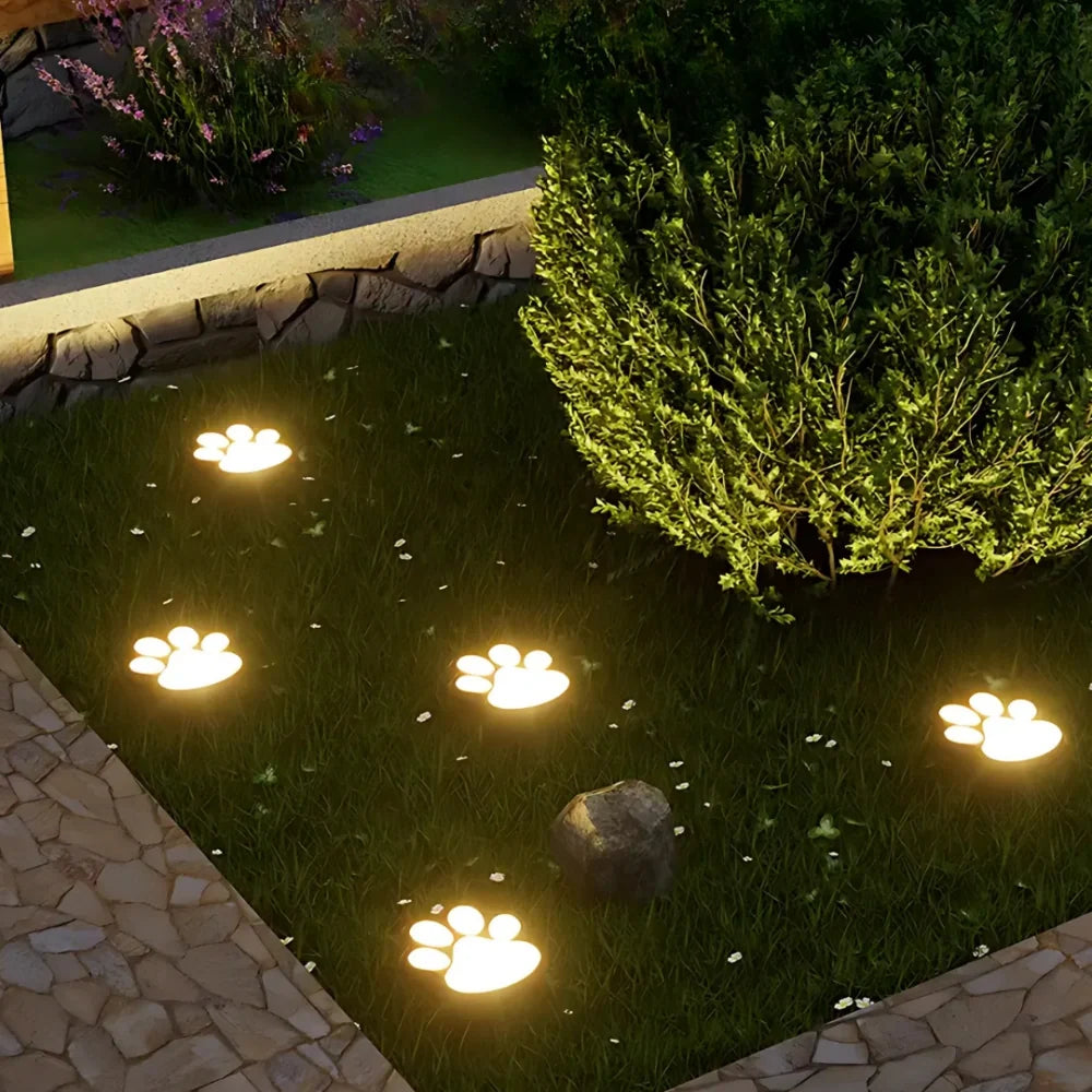 PawGlow™ Solar-Gartenleuchte mit Pfotenabdruck, warmweiß