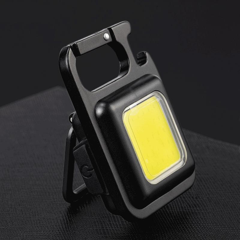 Multifunktionale Schlüsselanhänger-Taschenlampe mit Flaschenöffner