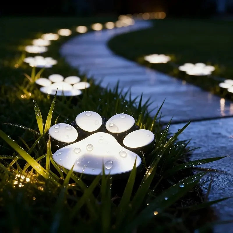 PawGlow™ Solar-Gartenleuchte mit Pfotenabdruck, warmweiß
