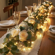 Botanische Lichterkette mit Blättern und Blüten, warmweiß