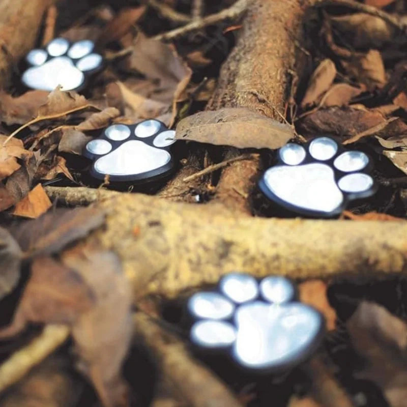 PawGlow™ Solar-Gartenleuchte mit Pfotenabdruck, warmweiß