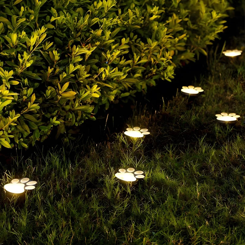 PawGlow™ Solar-Gartenleuchte mit Pfotenabdruck, warmweiß